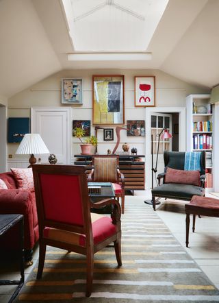 Chester Jones' London flat has a brokenstripe wool rug woven in Turkey to Bens design which enlivens floorboards painted...