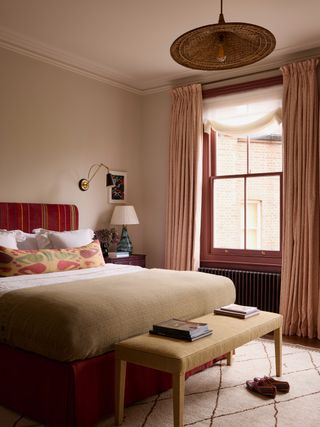 Image may contain Lamp Indoors Interior Design Home Decor Bed Furniture Clothing Footwear Shoe Art and Painting