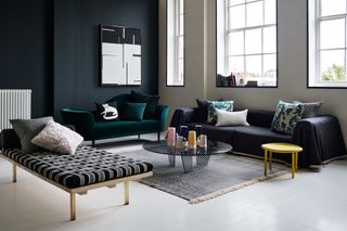 Image may contain Furniture Couch Table Living Room Indoors Room Coffee Table and Rug
