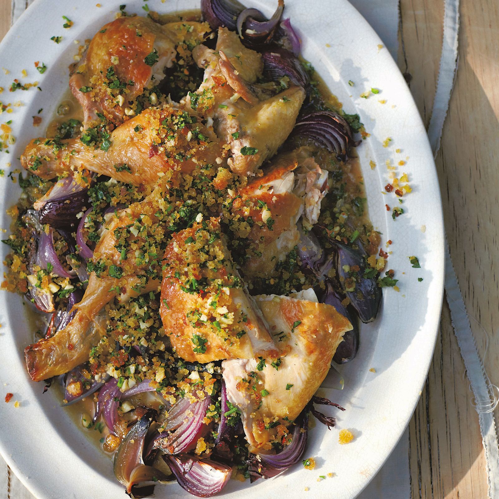 Spatchcocked chicken with chilli, garlic, parsley and almond pangrattato