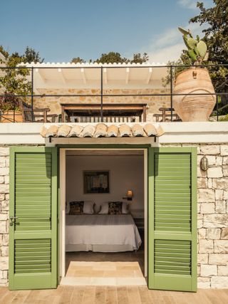 On a hill overlooking a small marina on Paxos this special house has been added to lived in and loved by its Italian...