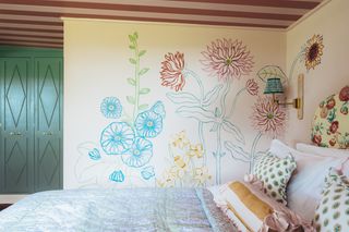 Image may contain Cushion Home Decor Indoors Interior Design Architecture Building Wall Bed Furniture and Art