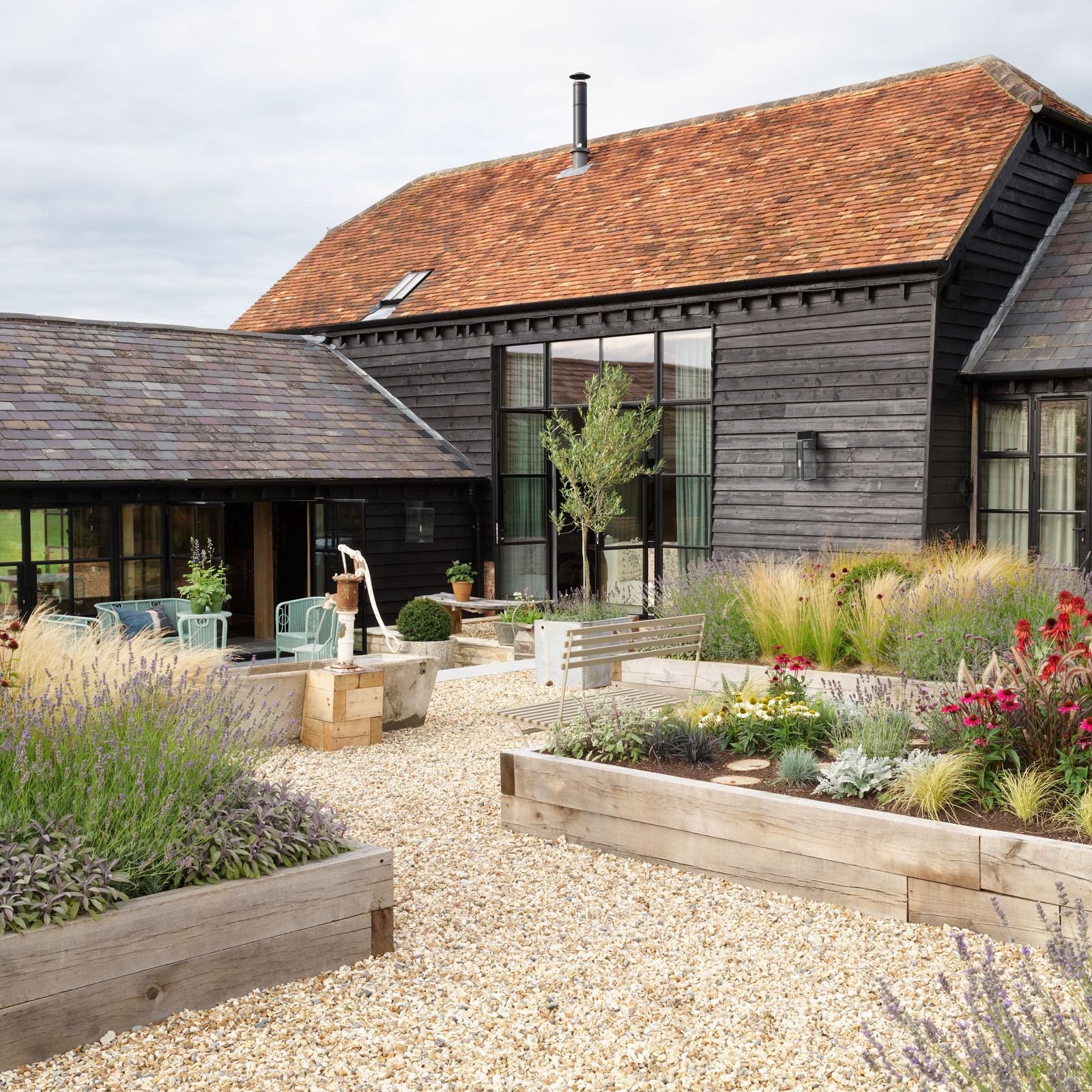 Hubert Zandberg transforms a 19th-century barn with a masterfully restrained palette of materials