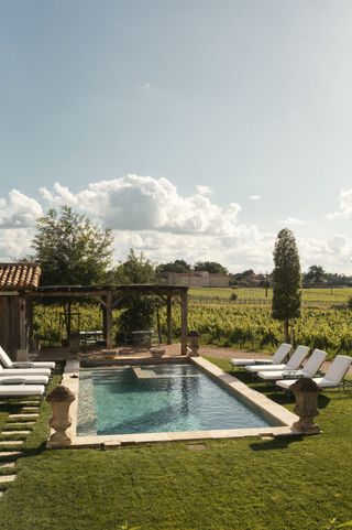 Image may contain Backyard Nature Outdoors Yard Pool Water Architecture Building House Housing and Porch