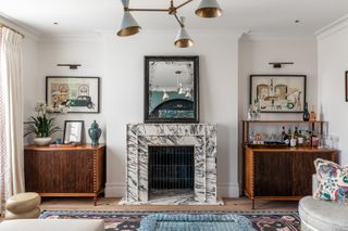 Image may contain Interior Design Indoors Living Room Room Fireplace Flooring Furniture Wood Floor and Hearth