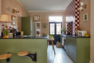 Image may contain Indoors Room Furniture Flooring Interior Design Wood and Kitchen